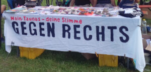 banner mit der Aufschrift "Main-Taunus deine Stimme GEGEN RECHTS"